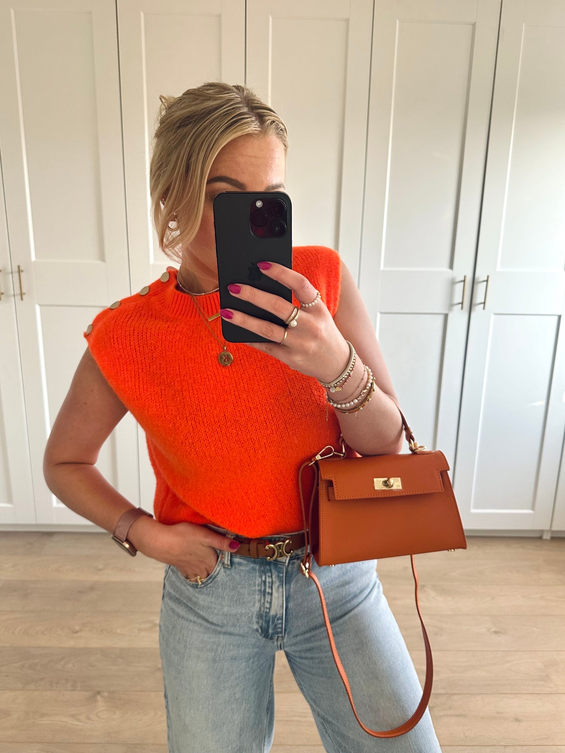 Mouwloze top met gouden knopen - oranje