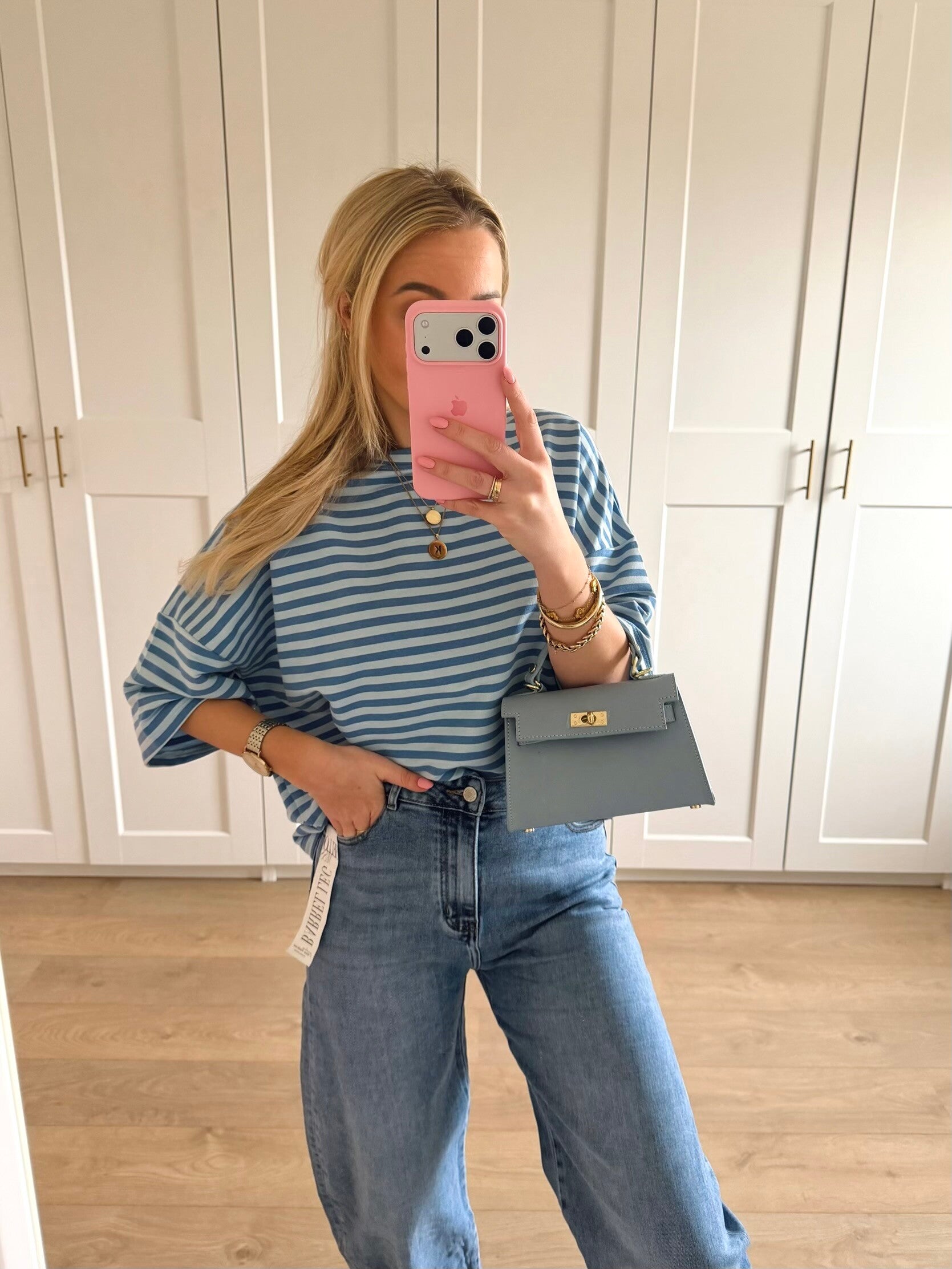 Gestreepte top met driekwart mouw - blauw