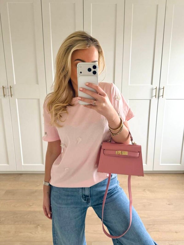 T-shirt met witte bloemen - roze