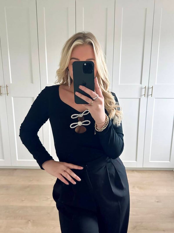 Body met zilveren glitter strikken - zwart