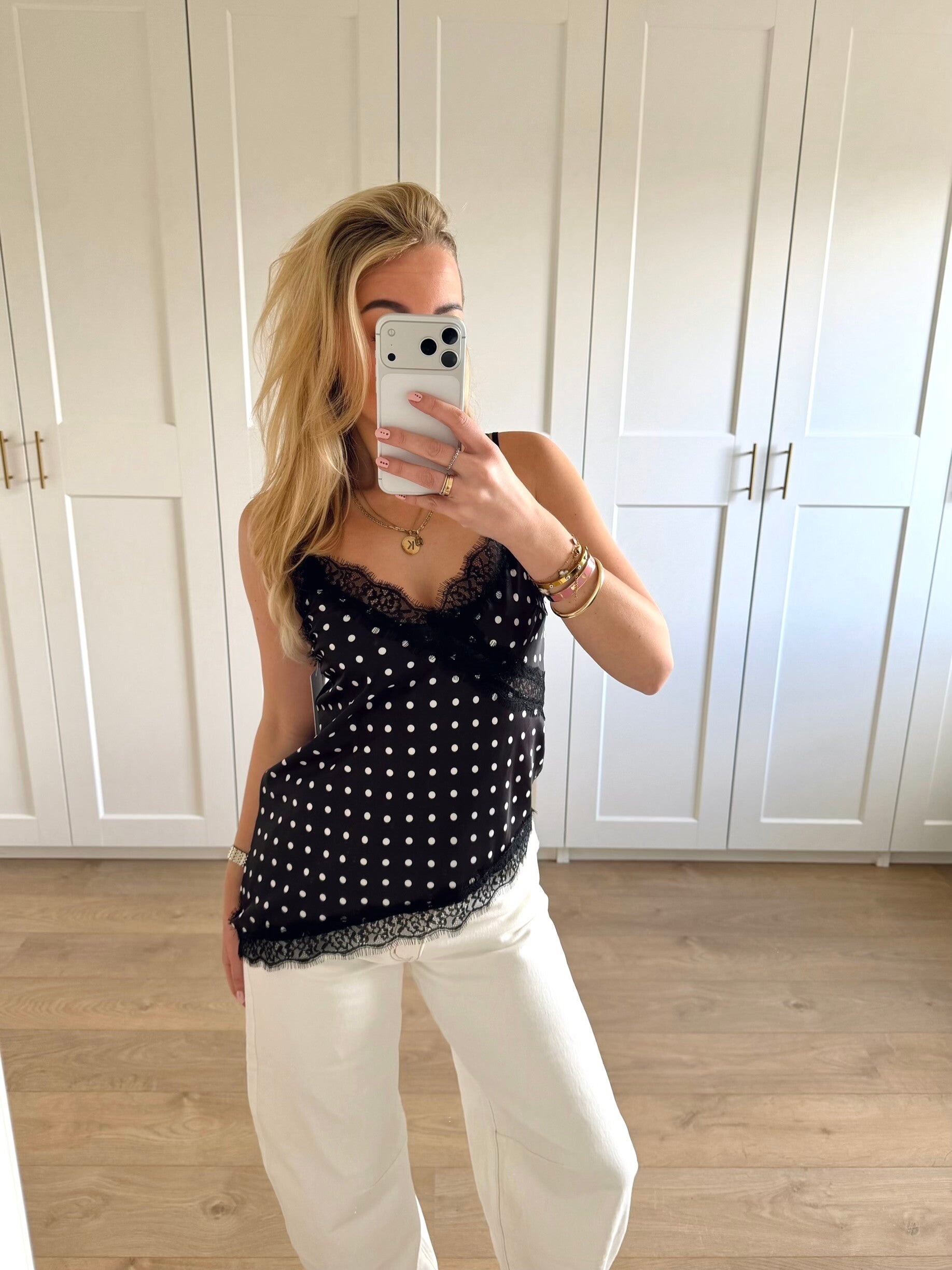 Stippen top met kant - zwart/wit