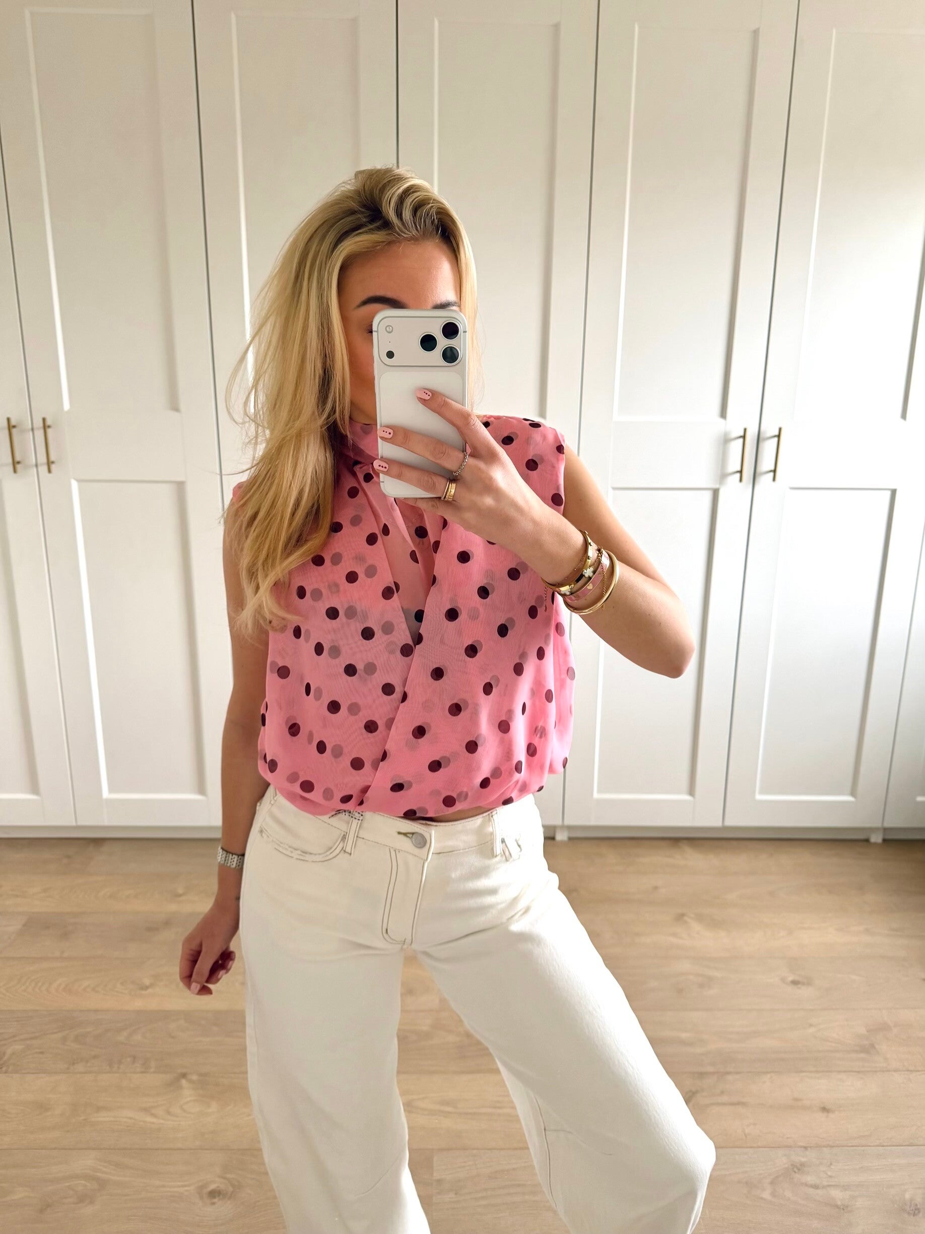 Mouwloze stippen top - roze