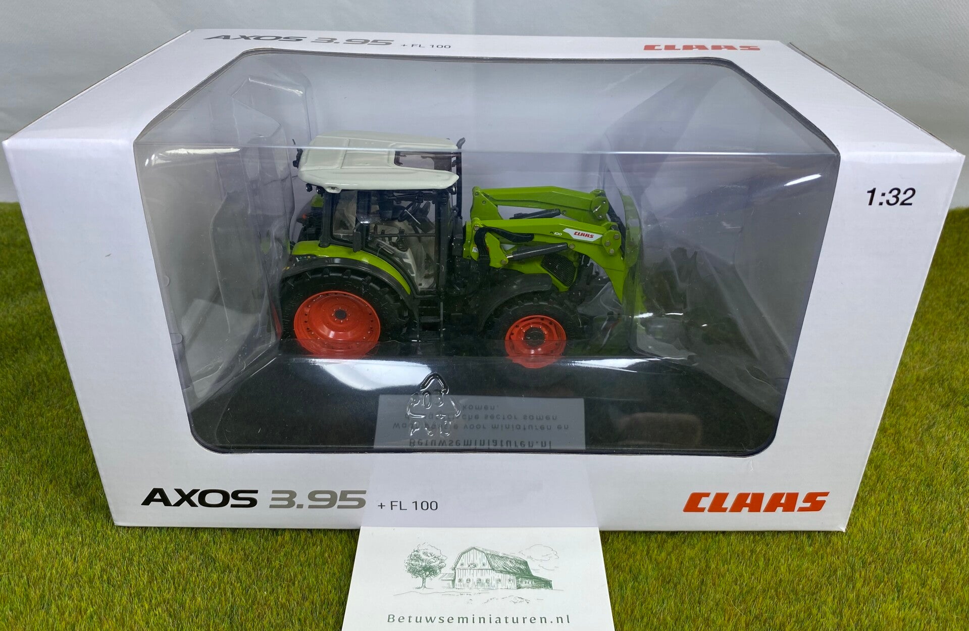 Claas Axos 3.95 met FL100 voorlader