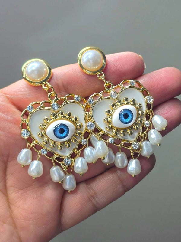 Arete ojo real blanco