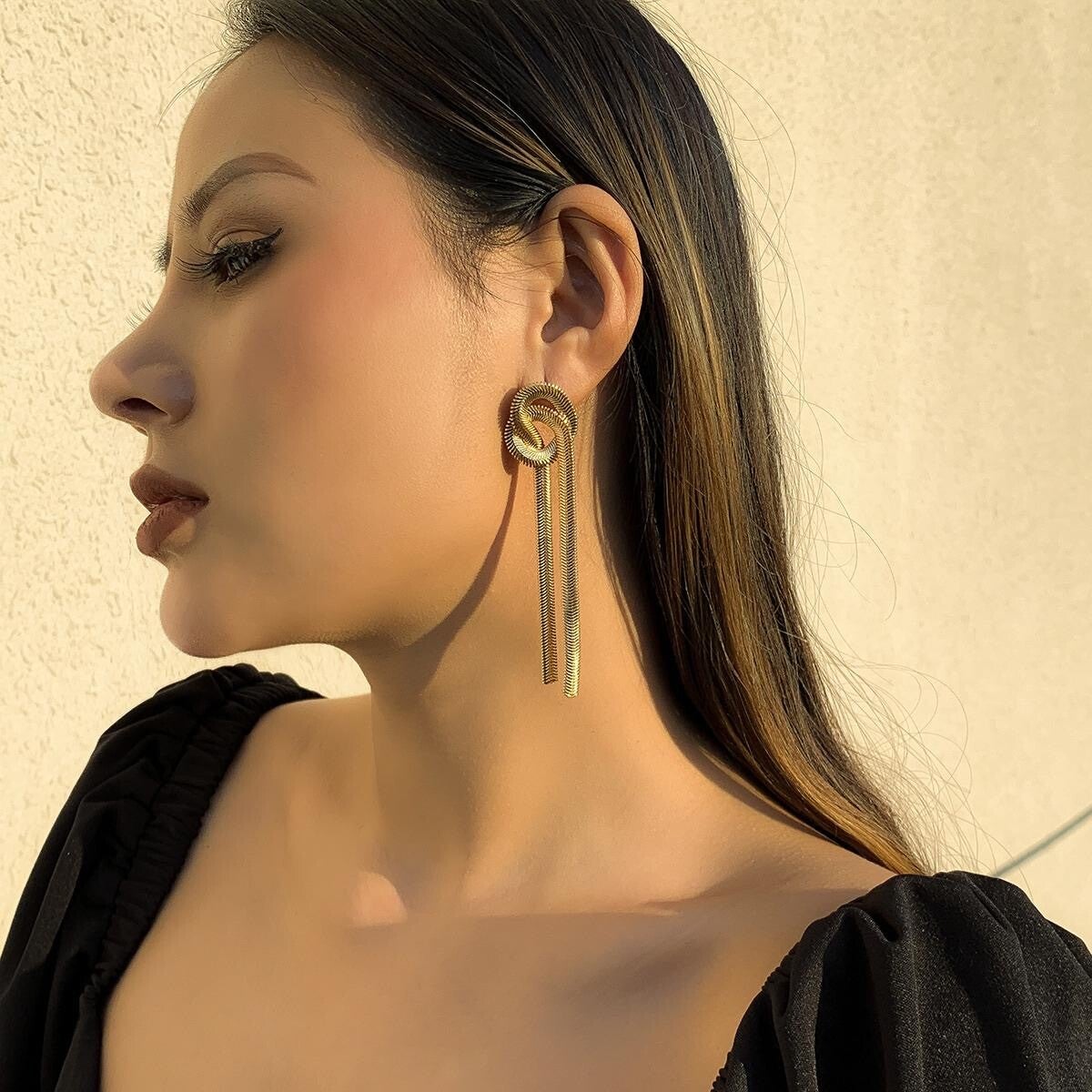 Arete planchado dorado