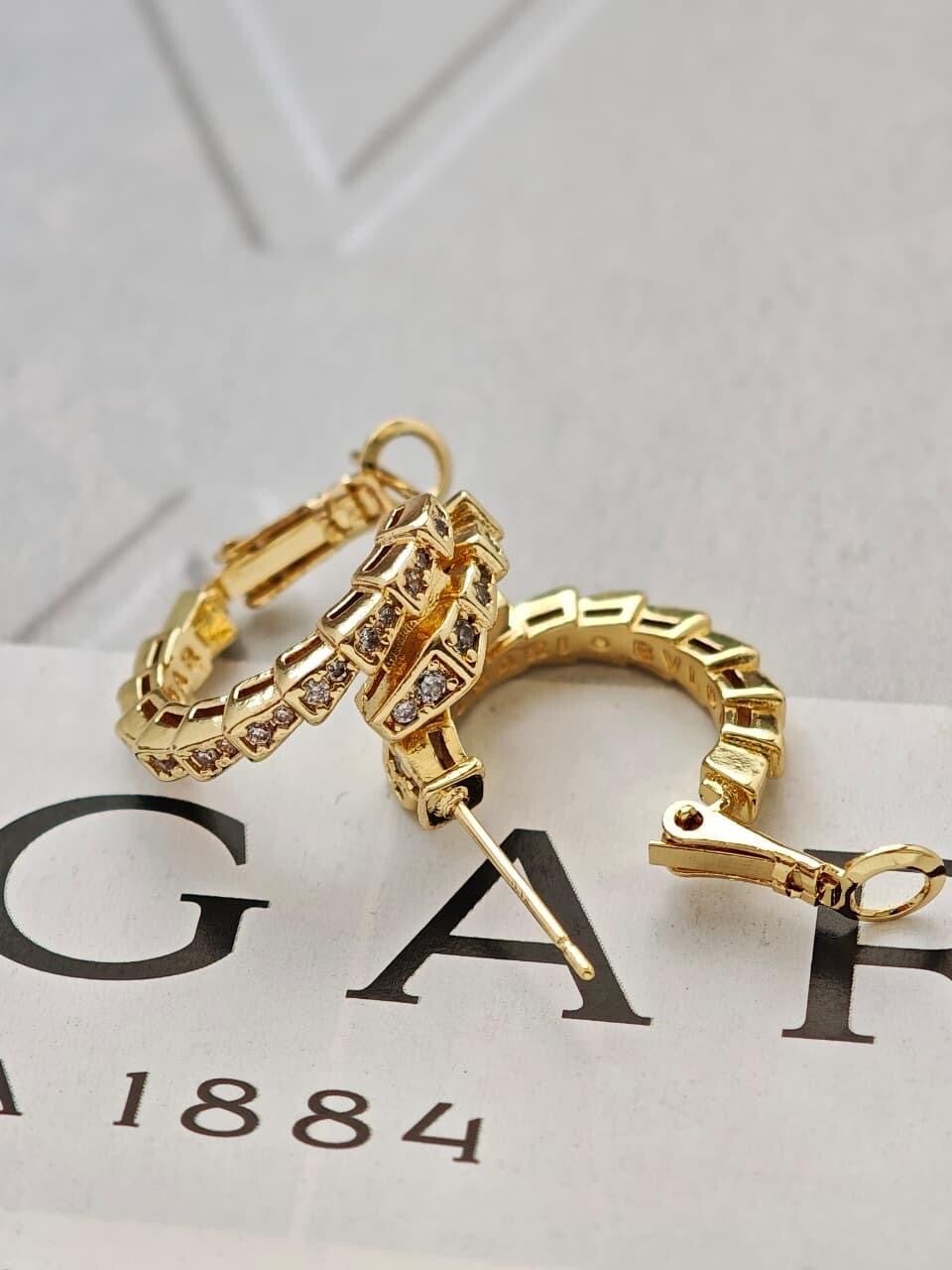 Arracada Bulgari dorado