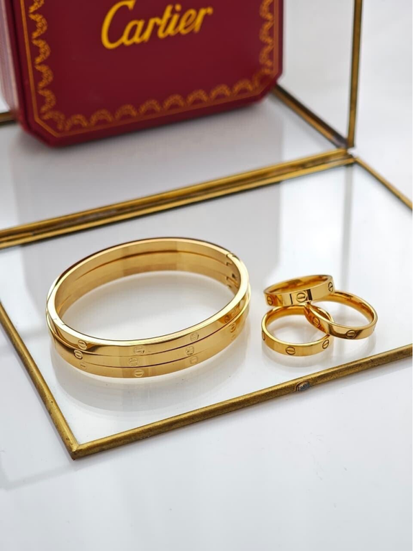 Set brazalete cartier dorado liso