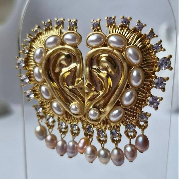 ARETE SCHIAPARELLI OREJA