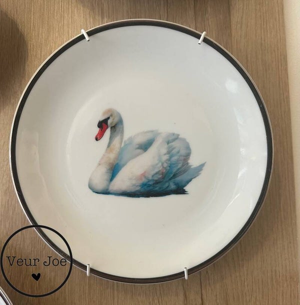 Bord met zwaan