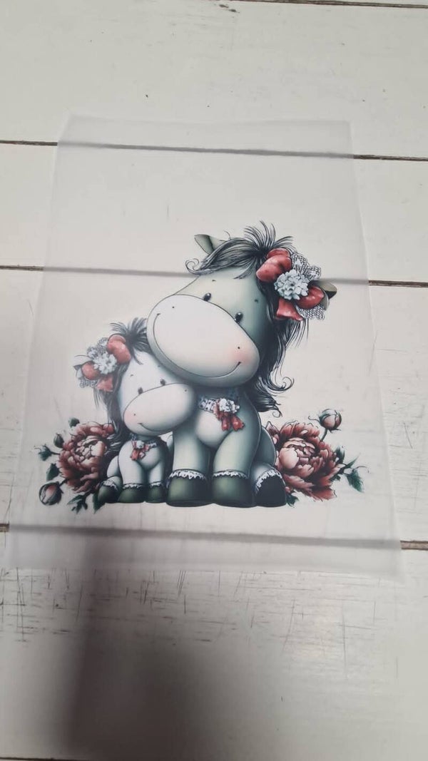 mamma en kind  paard