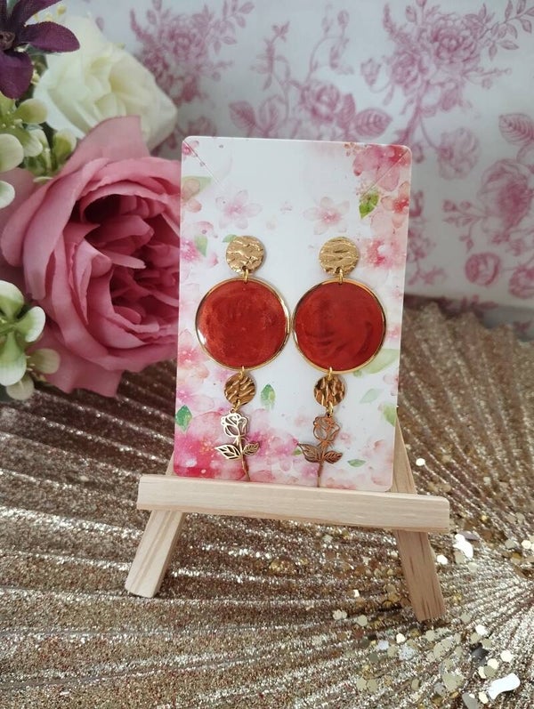 Boucles d'oreilles et son bronze