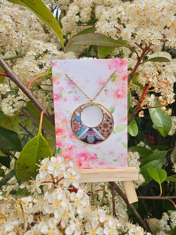 Collier doré triple rosaces