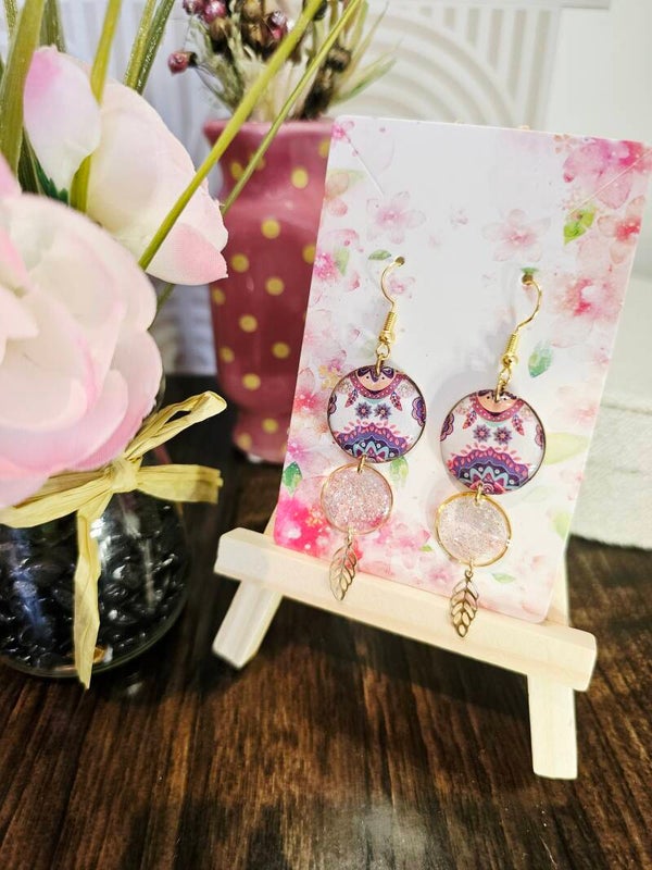 Boucles rose paillettées