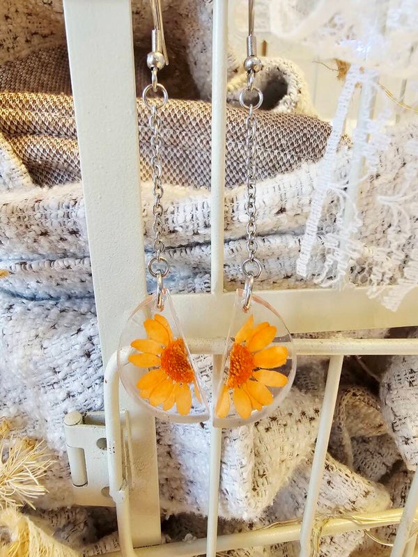 Boucles marguerites oranges
