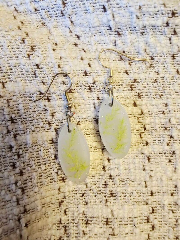 Boucles losanges blanches fleuilles