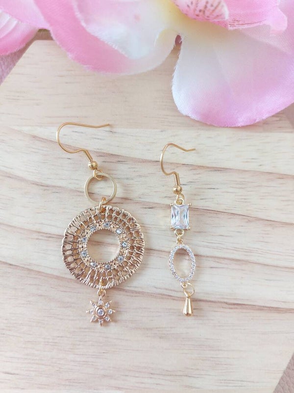 Boucles d’oreilles asymétriques