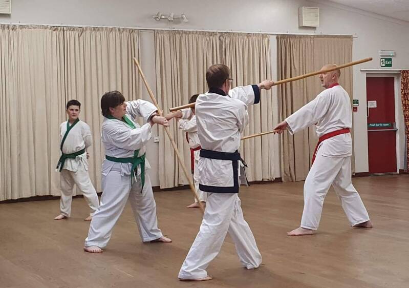 Children and Adults Training Martial Arts