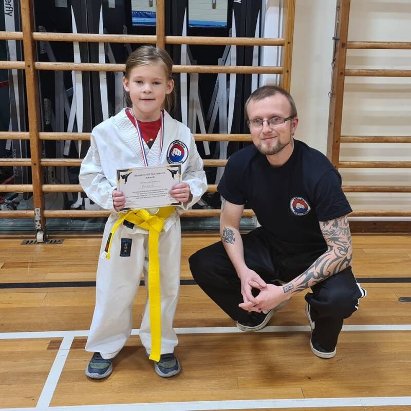 Children and Adults Training Martial Arts