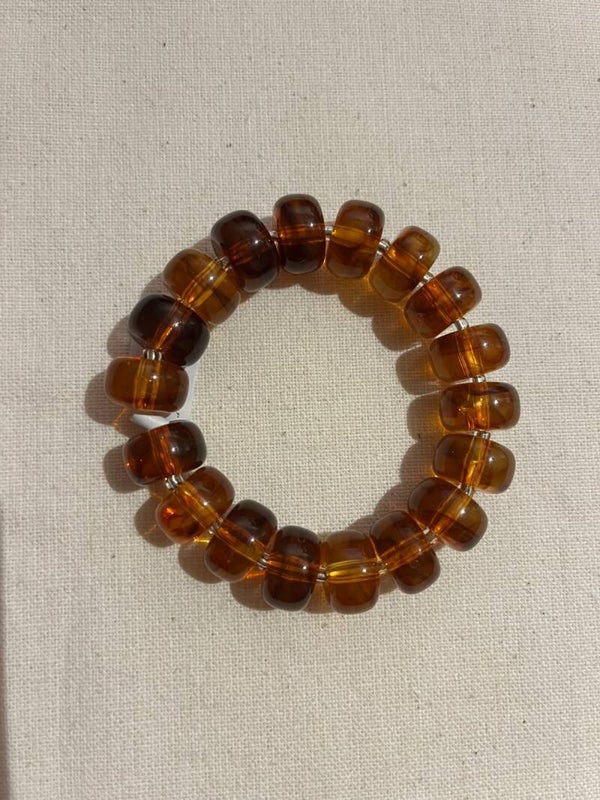 Armband - donkerbruin transparant