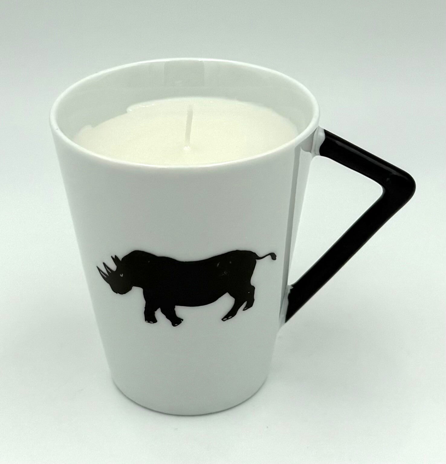 Kerze in Tasse