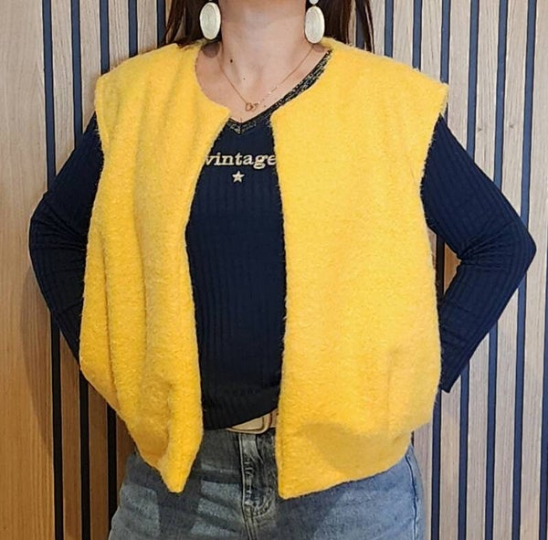 Gilet sans manche avec pinces et poches