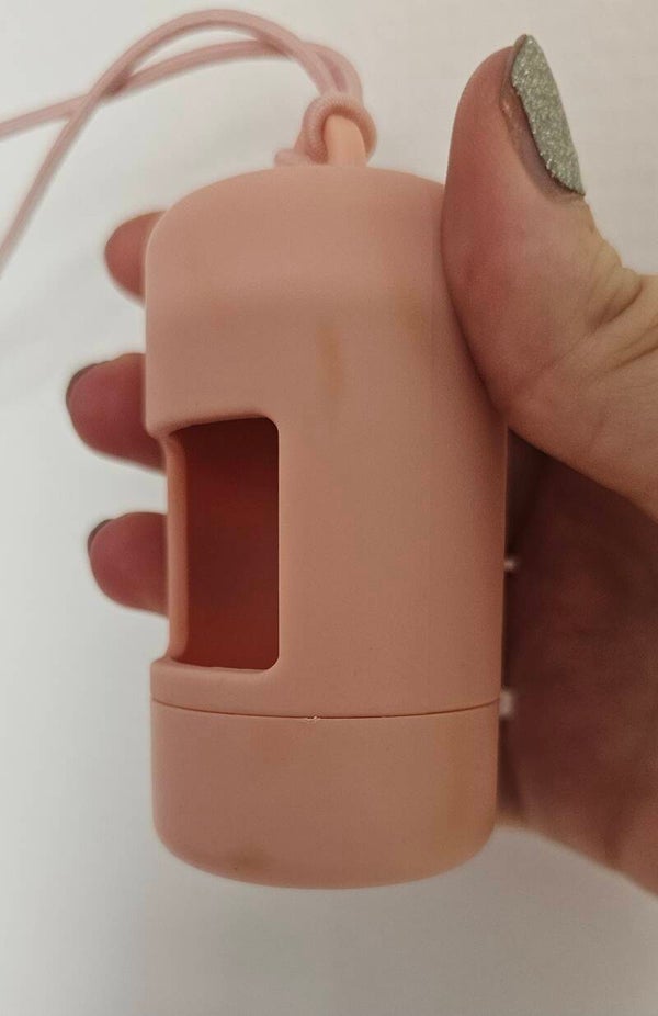 Poepzakjes houder roze (goed lezen)