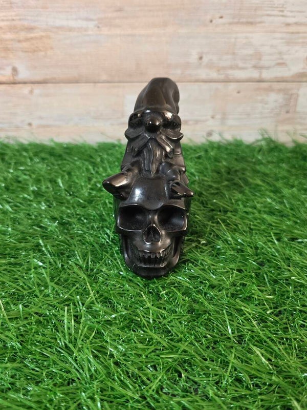 Obsidiaan skull met kabouter