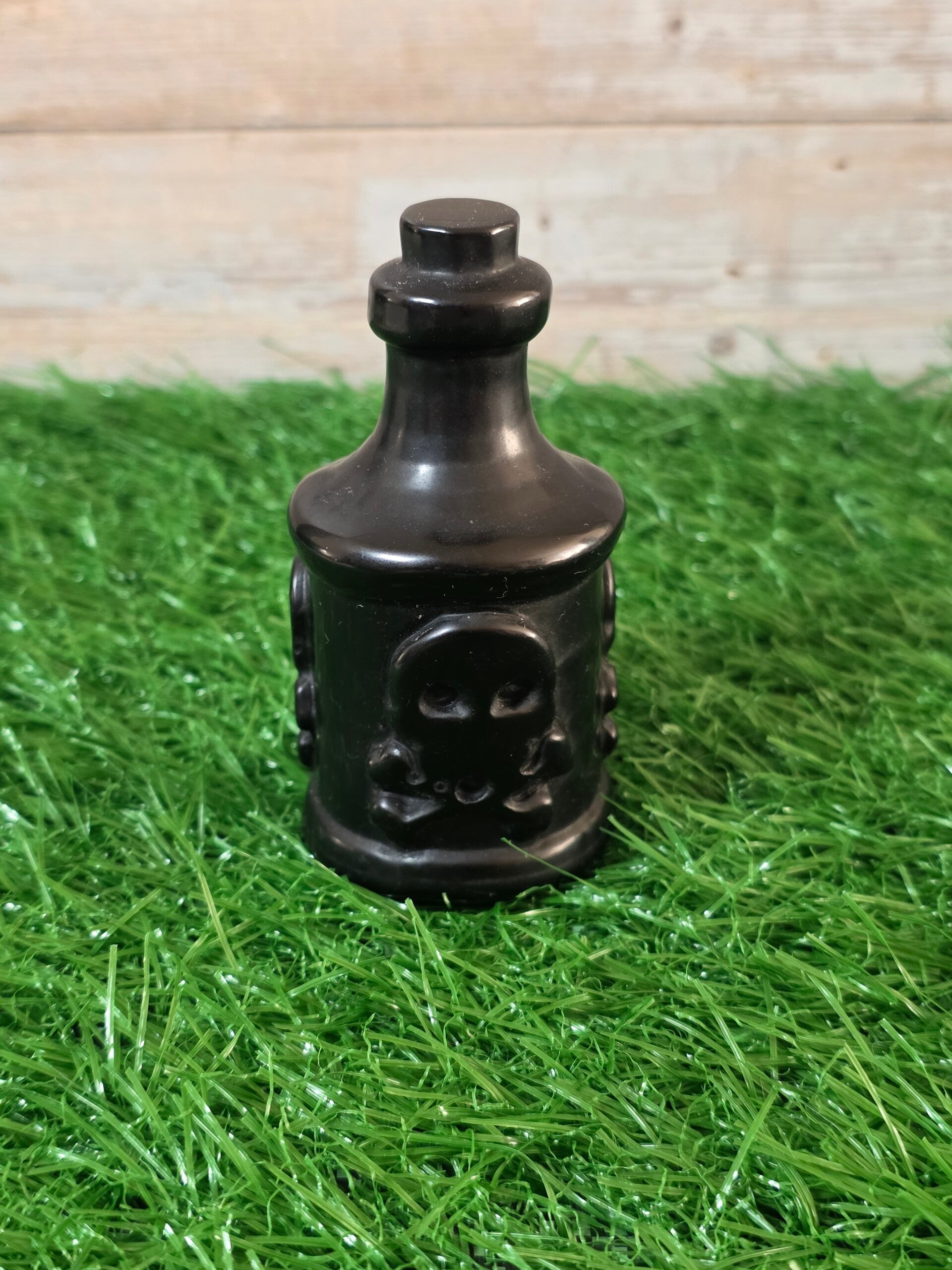 Obsidiaan poison fles