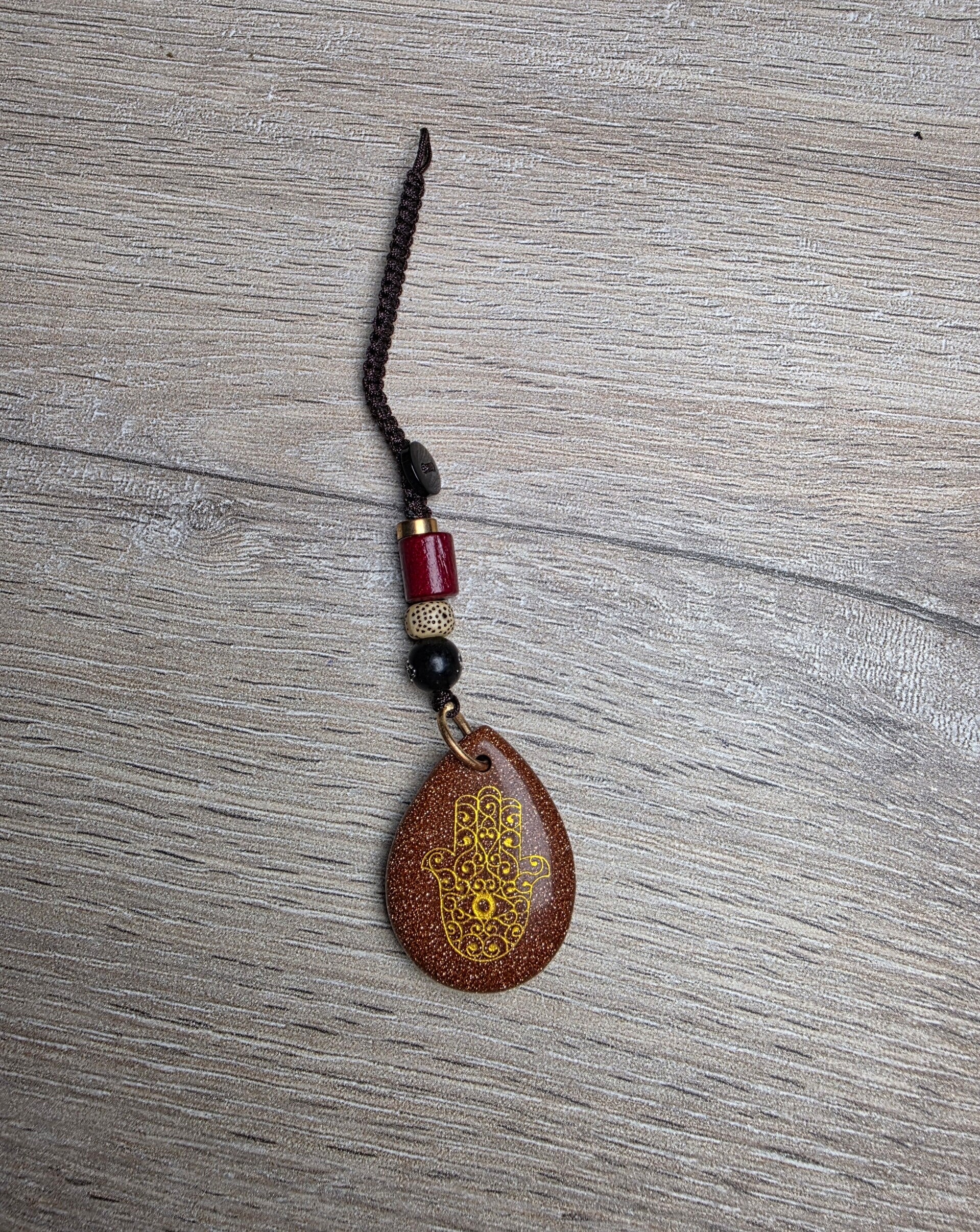 Hanger Gouden Zandsteen Hamsa hand