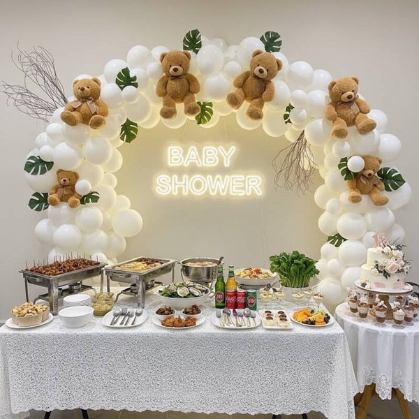 Decorate with balloon garlands, guests can choose their preferred colours