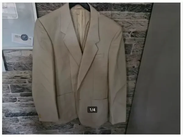 Crèmekleurig jasje Maat 50