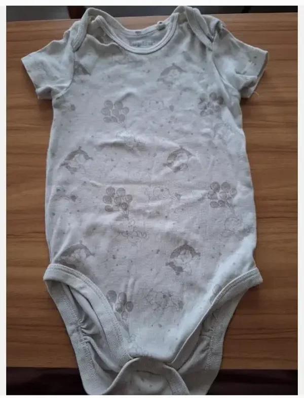 Beige romper met olifantjes maat 74-80