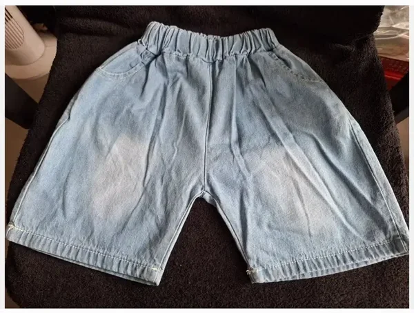 Blauwe korte broek met giraffe maat 98