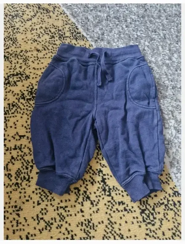 Donkerblauwe brede joggingsbroek maat 68