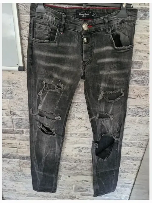 Donkergrijze spijkerbroek met gaten maat 42