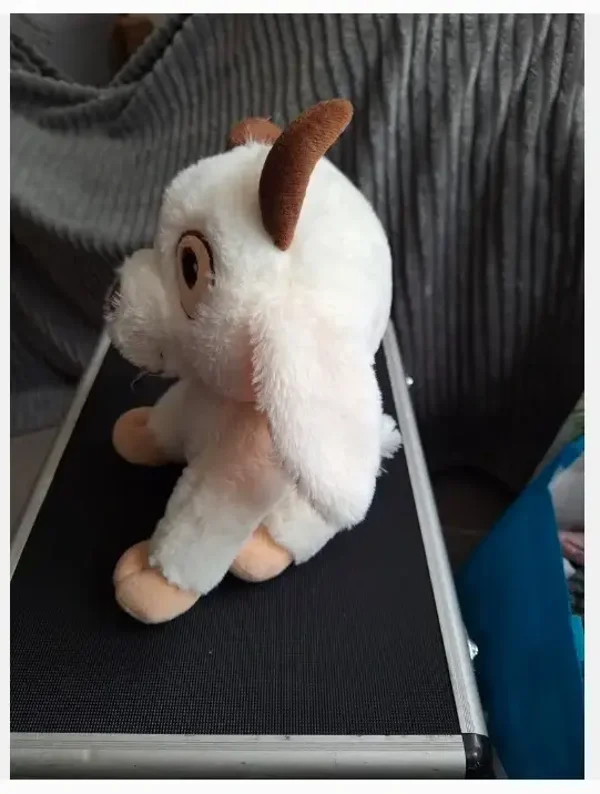 Geit knuffel met grote ogen