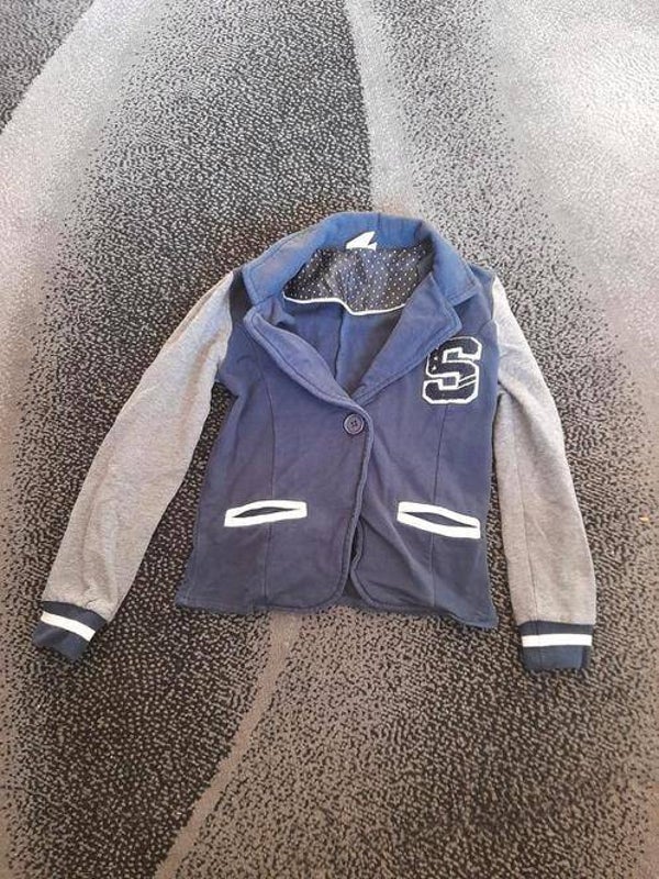 Grijs blauwe blazer maat 110