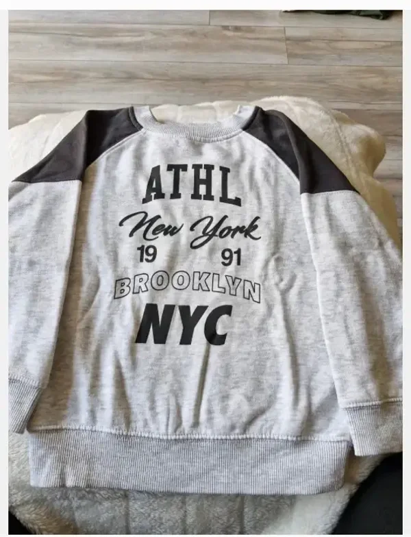 Grijze new York 1991 trui maat 110