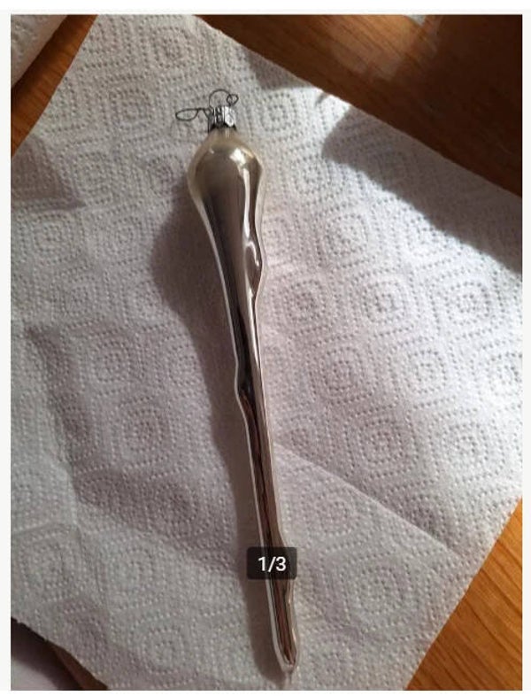 Lange zilverkleurige pegel