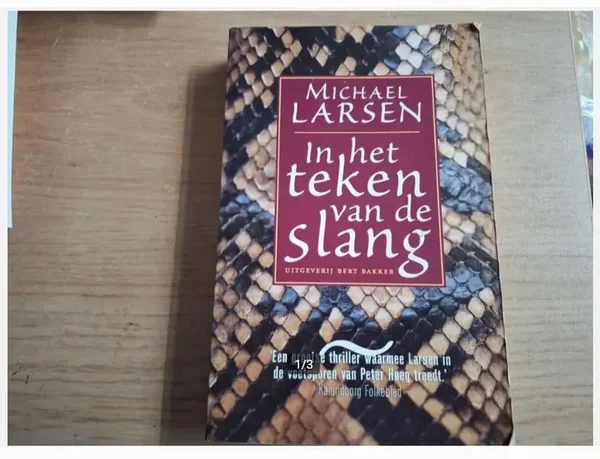 M. Larsen - In het teken van de slang