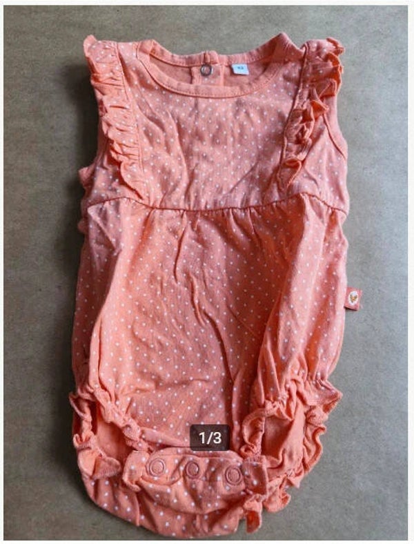 Roze shirt romper Met witte stippen Maat 62