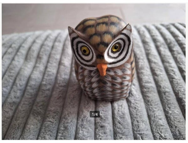 UIL uit hout beeldje