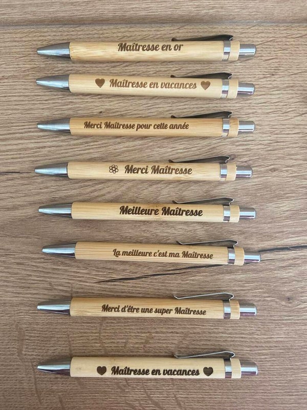 Stylos en bois gravés