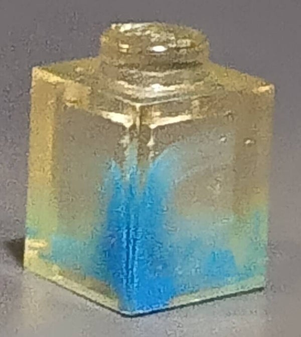 1x1 marbled trans clear brick