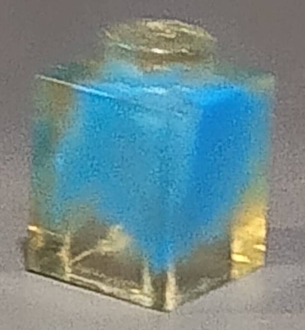 1x1 marbled trans clear brick