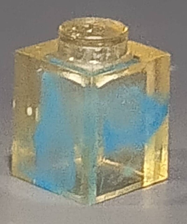 1x1 marbled trans clear brick