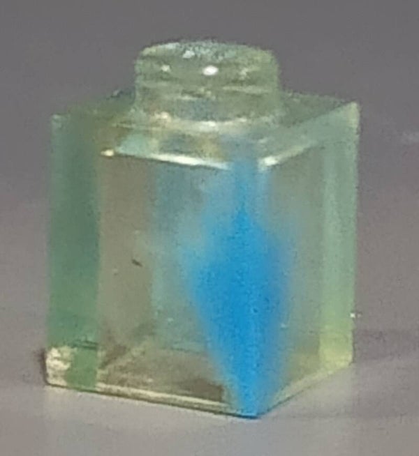 1x1 marbled trans clear brick