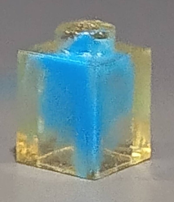 1x1 marbled trans clear brick