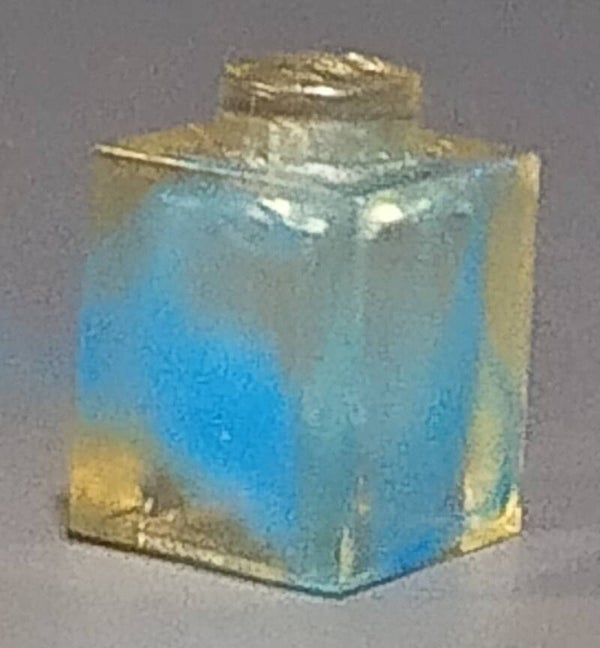 1x1 marbled trans clear brick