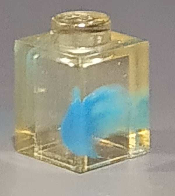 1x1 marbled trans clear brick